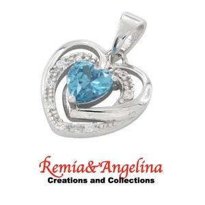 Sterling Silver Precious Heart Blue Topaz Pendant